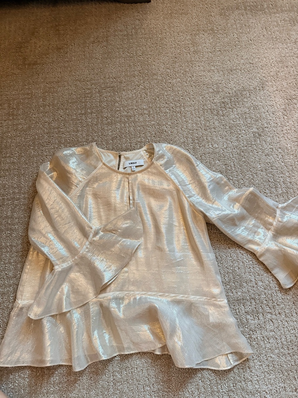 Likely Metallic Cream Ruffle Hem Top